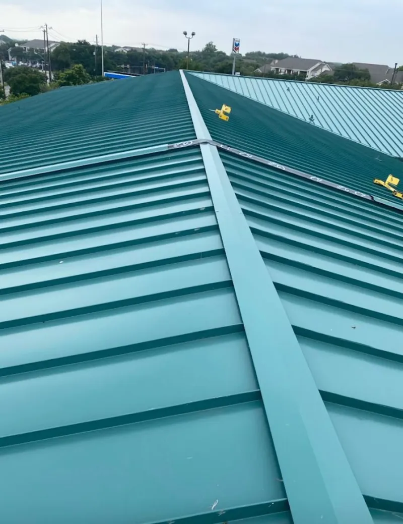Green commercial metal roof ridge and valley for Metal Roof Repair in Merced